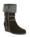 Just in time for winter and right on trend. Fashionable faux fur lends rugged appeal to the Brandia wedge booties by Easy Spirit.