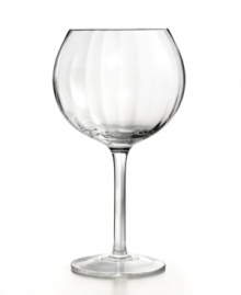 Simply beautiful, this set of hand-blown Optic balloon wine glasses from Artland features clear stems and gently faceted bowls for a dreamy, twinkling effect. In dishwasher-safe glass for effortless elegance. Simply beautiful, this set of hand-blown Optic balloon wine glasses from Artland features clear stems and gently faceted bowls for a dreamy, twinkling effect. In dishwasher-safe glass for effortless elegance.