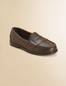 A classic penny loafer is rendered in refined leather for a timeless statement.Slip-onLeather upperLeather liningRubber solePadded insoleImported