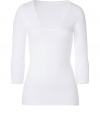 Stylish T-shirt in white stretch rayon - very soft and pleasant quality - low V-neck - sleeves in discreet 3/4 length, ideal for women who dont like to reveal their arms or wear the top at the office - slim and slightly waist fitted - new basic - feminine and comfortable alternative for a blouse - wear with a pant suit, pleated skirt, cardigan