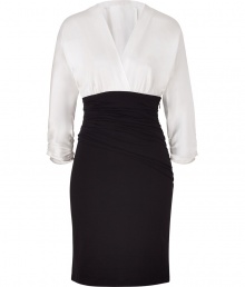 Contrast texture and color to elegant effect with Paule Kas white and black silk and cotton blend dress - Especially flattering, thanks to a touch of stretch - Wrap-style bodice with deep v-neck and gathered, 3/4 sleeves - High-waisted, ruched pencil skirt hits above the knee - Zips at side -  Seamlessly transitions from the office to evenings out - Pair with platform pumps, ankle booties or strappy sandals