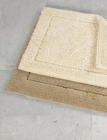 Crafted in a century-old mill in Portugal, this reversible rug offers plush tufting on one side, thick loops on the other, both luxurious underfoot.Reversible Small: 20 X 31 Large: 23 X 39 Cotton Machine wash Imported Crafted in a century-old mill in Portugal, this reversible rug offers plush tufting on one side, thick loops on the other, both luxurious underfoot.Reversible Small: 20 X 31 Large: 23 X 39 Cotton Machine wash Imported