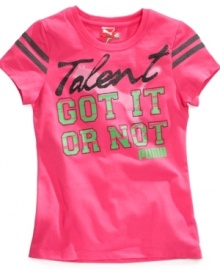She's definitely got style in spades thanks to this graphic, electric-pink tee from Puma. She's definitely got style in spades thanks to this graphic, electric-pink tee from Puma.