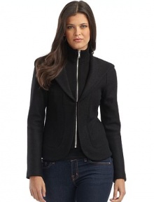 THE LOOKSoft felted wool with inner zippered knit layerDraped hoodBeautifully seamed for shapeWelted detailSingle hook-and-eye outer layer closeTHE FITAbout 22 from shoulder to hemTHE MATERIALFelted woolCARE & ORIGINHand wash or dry cleanImported