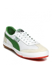Other kicks will envy these streamlined PUMA sneakers, featuring lush green suede stripes and color-pop neon soles. Other kicks will envy these streamlined PUMA sneakers, featuring lush green suede stripes and color-pop neon soles.