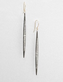 Aptly named, these elongated pod-like strands of oxidized silver are set with graduated rows of dazzling diamonds, tapering as they drop.Diamonds, .40 tcwSterling silver and 14k yellow goldDrop, about 2½Ear wireMade in USA