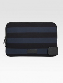 Striped neoprene zips around your laptop for a stylish, protective cover.Zip closureNeoprene13W x 8HImported Striped neoprene zips around your laptop for a stylish, protective cover.Zip closureNeoprene13W x 8HImported