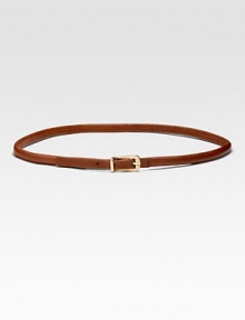 Rich skinny leather strip with goldtone hardware is the perfect waist-cinching accessory.About ½ wide Cow leather Imported Rich skinny leather strip with goldtone hardware is the perfect waist-cinching accessory.About ½ wide Cow leather Imported