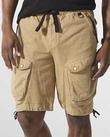 Pairing the uncompromised softness of a knit with the sleek details of classic cargo styling, a rugged utility jersey short becomes a modern must-have for style and performance. Pairing the uncompromised softness of a knit with the sleek details of classic cargo styling, a rugged utility jersey short becomes a modern must-have for style and performance.