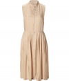 Gorgeous daytime dress in nude - Sleeveless with small collar and button panel - Slightly-flared skirt gives the feminine cut movement - Play up the preppy look with a cashmere cardigan and ballet flats - Perfect piece for the office or an elegant brunch