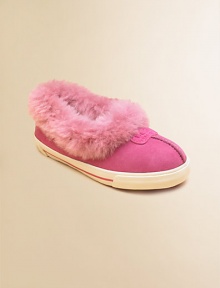 What could be warmer on wintry mornings and nights than the softness of sheepskin for those little feet.Suede upper Sheepskin sock liner and collar Vulcanized rubber sole Embossed logo tab on upper Imported What could be warmer on wintry mornings and nights than the softness of sheepskin for those little feet.Suede upper Sheepskin sock liner and collar Vulcanized rubber sole Embossed logo tab on upper Imported