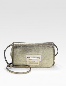 Iconic logo pattern on natural linen, trimmed with soft leather and finished with dual straps for versatility.Top handle, 5 drop Adjustable shoulder strap, 19-26 drop 13W X 10H X 5D Turnlock closure Protective metal feet One inside zip pocket Fully lined Made in Italy