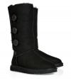Logo-detailed buttons and an easy-to-style tall length makes these cozy-chic shearling boots from UGG Australia a cold weather must-have - Round toe, rugged rubber sole, cozy shearling lining, back logo detail, mid-shaft length, three-button side closure - Pair with skinny jeans, an oversized cashmere sweater, and a down jacket or wool cape