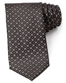 Bring your look into sharp focus with a rich Italian silk tie from Canali, delicately patterned for a unique addition to your workweek wardrobe. Bring your look into sharp focus with a rich Italian silk tie from Canali, delicately patterned for a unique addition to your workweek wardrobe.