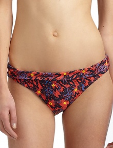 THE LOOKSpirited abstract animal and floral printStretch bottom has fold-over topTHE MATERIAL80% nylon/20% spandexFully linedCARE & ORIGINHand washImportedPlease note: Bikini top sold separately. THE LOOKSpirited abstract animal and floral printStretch bottom has fold-over topTHE MATERIAL80% nylon/20% spandexFully linedCARE & ORIGINHand washImportedPlease note: Bikini top sold separately.