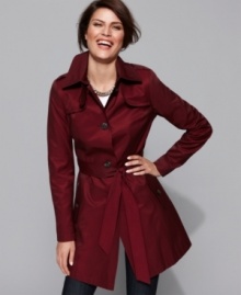 DKNY's lightweight trench is effortlessly chic and shields you from those windy days. This classic gets updated for the season with a slim, streamlined silhouette. (Clearance) DKNY's lightweight trench is effortlessly chic and shields you from those windy days. This classic gets updated for the season with a slim, streamlined silhouette. (Clearance)