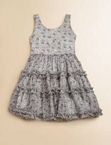 Luxe and lovely organza frappe is printed with a pretty pebbles pattern and embellished with tiers of ruffles on a full skirt.ScoopneckSleevelessPullover styleSmocked waistRuffled tiersRuffled hemFully linedPolyesterHand wash coldImported Luxe and lovely organza frappe is printed with a pretty pebbles pattern and embellished with tiers of ruffles on a full skirt.ScoopneckSleevelessPullover styleSmocked waistRuffled tiersRuffled hemFully linedPolyesterHand wash coldImported