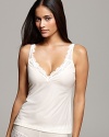 An ultra soft camisole with floral lace trim along straps and a deep V-neckline.