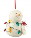 Brighten every day of the season with a snowman ornament that, tangled in red, gold and teal lights, beams with happiness and holiday spirit.