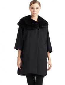 THE LOOKSilky smooth rabbit fur shawl collarTailored from fine wool/angoraConcealed front buttonsThree-quarter length cape sleevesDual front welt pocketsSide slitsTHE FITAbout 36 from shoulder to hemTHE MATERIALWool/angoraTrim: dyed rabbit furFully linedCARE & ORIGINDry clean by fur specialistMade in ItalyFur origin: ChinaModel shown is 5'9 (175cm) wearing US size 4. THE LOOKSilky smooth rabbit fur shawl collarTailored from fine wool/angoraConcealed front buttonsThree-quarter length cape sleevesDual front welt pocketsSide slitsTHE FITAbout 36 from shoulder to hemTHE MATERIALWool/angoraTrim: dyed rabbit furFully linedCARE & ORIGINDry clean by fur specialistMade in ItalyFur origin: ChinaModel shown is 5'9 (175cm) wearing US size 4.
