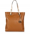 Sophisticated with simple, clean lines, MICHAEL Michael Kors textured leather tote is an elegant and versatile choice - Natural flat double top handles with buckle detail at base, metal logo on front, logo charm attached to handle, inside zippered back wall pocket, front wall slot pocket, cinch strap, strap with clip attached for keys - The perfect choice for work, school or running errands