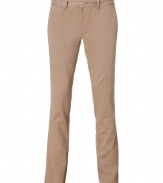 Add preppy-cool style to your workweek look with these modernized classic chinos from Woolrich - Flat front, belt loops, off-seam pockets, back welt pockets with button detail, slim fit - Pair with a modernized chambray shirt, a retro-style cardigan, and oxfords