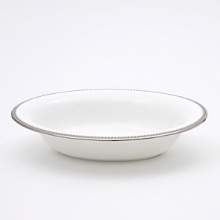 A beautiful collection for formal dining in white fine bone china with delicate platinum-hued rim accents. A beautiful collection for formal dining in white fine bone china with delicate platinum-hued rim accents.