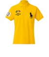 For a modern riff on a venerable classic, try Ralph Laurens big logo polo shirt - Soft yet durable bright yellow pique cotton - Slim, straight cut - Small collar and short button placket - Oversize polo pony logo at chest, numbered sleeve and XL numbered team graphic at back - Hem hangs slightly longer in the back - Casually cool, ideal for everyday leisure - Pair with jeans, chinos or shorts