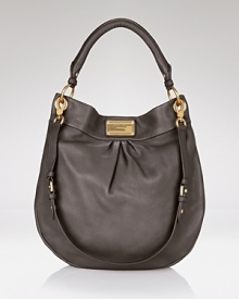 Give your accessories wardrobe a jolt with MARC BY MARC JACOBS' favorite leather hobo. With its covet-worthy shape and on-trend hue, this bag is destined to be the envy of the it-crowd. Give your accessories wardrobe a jolt with MARC BY MARC JACOBS' favorite leather hobo. With its covet-worthy shape and on-trend hue, this bag is destined to be the envy of the it-crowd.