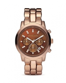A rich chocolate-hued mother of pearl dial is offset by a rose-gold tone bracelet. A rich chocolate-hued mother of pearl dial is offset by a rose-gold tone bracelet.