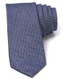 Knot this tonal tie for a dapper look that suits the summer and can be worn all year round, too. Knot this tonal tie for a dapper look that suits the summer and can be worn all year round, too.