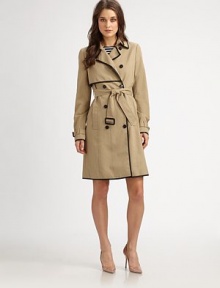 Timeless and versatile, this double-breasted trench boasts the impeccable tailoring and attention to fit that Theory is known for.Notch collar with hook-and-eye closureGun-flapButton frontSelf-beltSlash pocketsBack ventAbout 22 from shoulder to hemCottonMachine washImportedModel shown is 5'10 (177cm) wearing US size Small. Timeless and versatile, this double-breasted trench boasts the impeccable tailoring and attention to fit that Theory is known for.Notch collar with hook-and-eye closureGun-flapButton frontSelf-beltSlash pocketsBack ventAbout 22 from shoulder to hemCottonMachine washImportedModel shown is 5'10 (177cm) wearing US size Small.