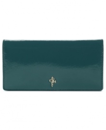 Understated, elegant and impossibly chic, this slender leather silhouette from Cole Haan perfectly pairs with your favorite satchel or tote. The well-organized interior is outfitted with plenty of compartments, while the outside is accented with the Cole Haan heritage logo on the flap. Understated, elegant and impossibly chic, this slender leather silhouette from Cole Haan perfectly pairs with your favorite satchel or tote. The well-organized interior is outfitted with plenty of compartments, while the outside is accented with the Cole Haan heritage logo on the flap.