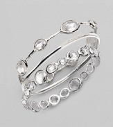 From the Paparazzi Collection. Ovals of faceted clear quartz shimmer within a bangle of polished sterling silver. Clear quartz Sterling silver Diameter, about 2¾ Imported Please note: Bracelets sold separately.