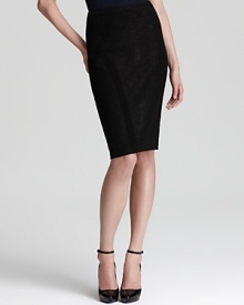 Metallic threading lends a subtle touch of glamour to this Donna Karan New York skirt, aligning the streamlined look with fall's hautest theme. Metallic threading lends a subtle touch of glamour to this Donna Karan New York skirt, aligning the streamlined look with fall's hautest theme.