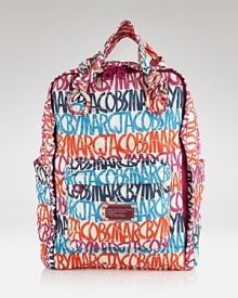 Keep in line with this logo-splashed backpack from MARC BY MARC JACOBS. With colorful consonants, it's sure to be the daytime bag on every label lover's wish list. Keep in line with this logo-splashed backpack from MARC BY MARC JACOBS. With colorful consonants, it's sure to be the daytime bag on every label lover's wish list.