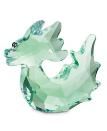 Inspired by a Chinese dragon symbolizing strength and luck, this emerald-green Swarovski crystal figurine is something to both treasure and give. With piercing jet-crystal eyes and dazzling faceted cuts. Inspired by a Chinese dragon symbolizing strength and luck, this emerald-green Swarovski crystal figurine is something to both treasure and give. With piercing jet-crystal eyes and dazzling faceted cuts.