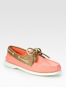 Soft canvas upper in a two-tone design adds a modern spin to this lace-up, leather-trimmed basic. Canvas upperCanvas liningLeather solePadded insoleImported Soft canvas upper in a two-tone design adds a modern spin to this lace-up, leather-trimmed basic. Canvas upperCanvas liningLeather solePadded insoleImported
