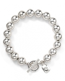 Shine in Lauren by Ralph Lauren's gleaming silver bead bracelet.