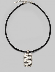 A military-inspired look with two versatile options: a carved tiger motif on one side and sapphire-embellished tiger stripes on the other. From the Macan Collection Sterling silver Leather Sapphires, 0.94 tcw Cord, about 18 long Imported A military-inspired look with two versatile options: a carved tiger motif on one side and sapphire-embellished tiger stripes on the other. From the Macan Collection Sterling silver Leather Sapphires, 0.94 tcw Cord, about 18 long Imported