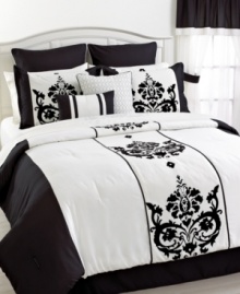 In black and white chic, this Santorino comforter set exudes elegance with a traditional flourish design, intricate quilting and embroidery and enough components to give your space a brand new look. In black and white chic, this Santorino comforter set exudes elegance with a traditional flourish design, intricate quilting and embroidery and enough components to give your space a brand new look.
