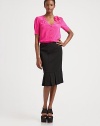 Fit and flare stretch jersey finished with a chic, pleated flounce.High waistVertical taped seamsSide zipperAbout 25 long69% rayon/29% nylon/2% elastaneDry cleanMade in USA of imported fabric