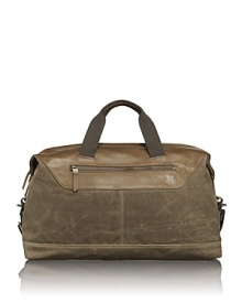 The Forge collection is rendered in wax-coated cotton canvas with leather trim accents and antiqued brass hardware for rugged appeal and utilitarian functionality. With vintage inspiration and artisan detailing, each bag is made to last and performs well in numerous environments. The satchel offers a classic shape with excellent organization pockets and works beautifully for overnight trips and weekend getaways. The Forge collection is rendered in wax-coated cotton canvas with leather trim accents and antiqued brass hardware for rugged appeal and utilitarian functionality. With vintage inspiration and artisan detailing, each bag is made to last and performs well in numerous environments. The satchel offers a classic shape with excellent organization pockets and works beautifully for overnight trips and weekend getaways.