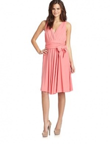 THE LOOKSurplice v-neckAllover ruchingTies at waist wrap-around bodiceSide zip with hook-and-eye closureTHE FITAbout 41 from shoulder to hemTHE MATERIAL69% acetate/23% nylon/8% elastaneFully linedCARE & ORIGINDry cleanImportedModel shown is 5'10½ (179cm) wearing US size 4. THE LOOKSurplice v-neckAllover ruchingTies at waist wrap-around bodiceSide zip with hook-and-eye closureTHE FITAbout 41 from shoulder to hemTHE MATERIAL69% acetate/23% nylon/8% elastaneFully linedCARE & ORIGINDry cleanImportedModel shown is 5'10½ (179cm) wearing US size 4.
