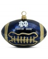 Team and Christmas spirit go hand in hand with the Notre Dame football ornament. Hand-painted glass is something students, alum and fans will cheer.