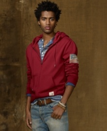 So soft you'll never want to take it off, a lightweight fleece hoodie achieves rugged all-American appeal with a flag patch. So soft you'll never want to take it off, a lightweight fleece hoodie achieves rugged all-American appeal with a flag patch.
