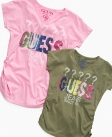 Confident cute. Shirred smocking accents on the sides of these tees from Guess give them a simple style that's perfect for summer. Confident cute. Shirred smocking accents on the sides of these tees from Guess give them a simple style that's perfect for summer.
