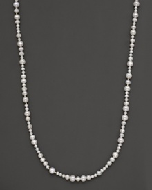 Mixed-size fresh water pearl necklace with 14 Kt. gold bead accents.