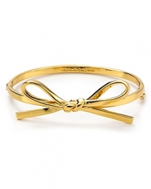 kate spade new york puts a rich spin on the girlish ribbon theme. This sweetly styled bangle is a chic reminder to be jeweled.