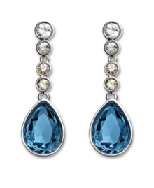 True blue: Made in silver tone mixed metal, Swarovski's Meringue Montana crystal and rhinestone earrings are an elegant finishing touch for your wardrobe. Approximate drop: 1-3/8 inches. True blue: Made in silver tone mixed metal, Swarovski's Meringue Montana crystal and rhinestone earrings are an elegant finishing touch for your wardrobe. Approximate drop: 1-3/8 inches.